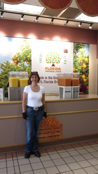 Enjoying fresh Florida orange juice at the State Information Centre