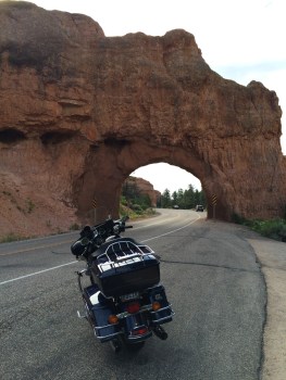 One of the two natural rock tunnels I rode through in Red Canyon